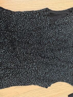 Laurence Kazar Black Top with Subtle Blue Accents